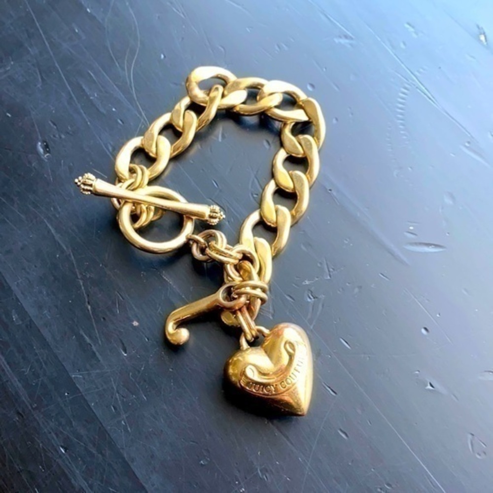 NWOT gold Juicy Couture weighted heart clasp &chain bracelet, pristine condition